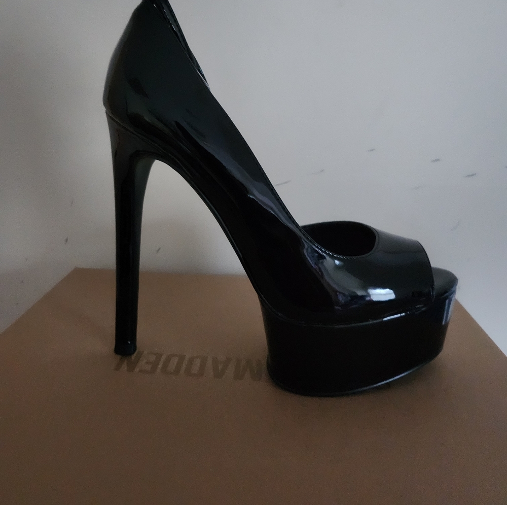 Black patent leather Steve Madden high heels size 7.